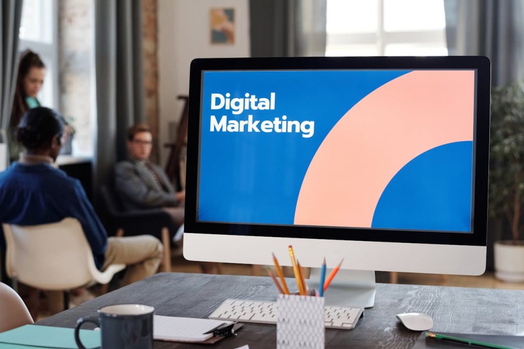 pexels-photo-6476193 Professionals in a creative office plan digital marketing strategies.